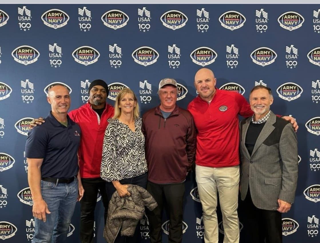 Jason Whitten and Brian Dawkins with the FMF & USAA Team