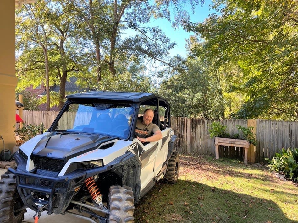 Pete Way in his UTV at home.